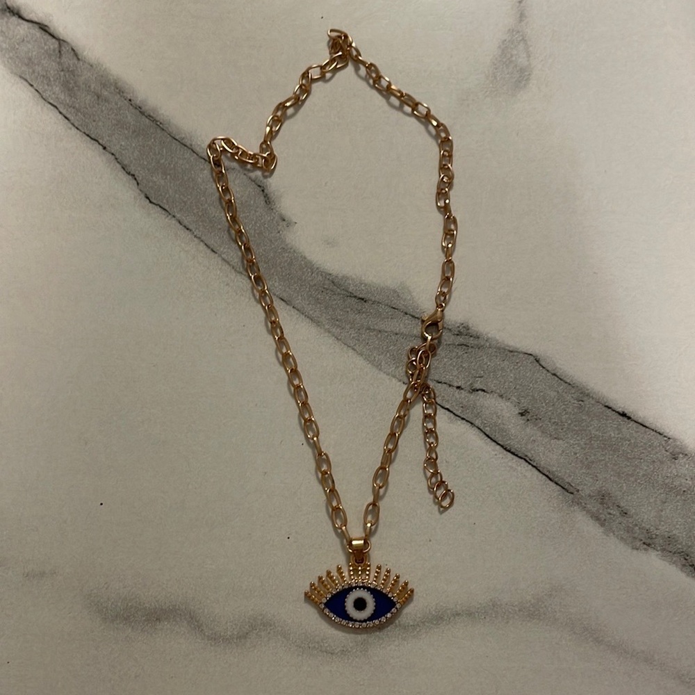 UNUSED Gold Evil Eye necklace.